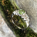 Ornate Oval Cut Peridot Ring with Diamond Step Detail