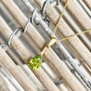 Pear Cut Peridot and Accent Diamond Drop Pendant