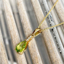 Pear Cut Peridot and Accent Diamond Drop Pendant