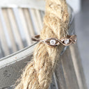 Twisted Rose Gold and Diamond Wedding Band