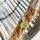 Double Claw Trilliant Cut Peridot Pendant