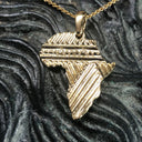 Patterned Solid Gold Africa Pendant
