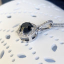 Round Cut Black Diamond Pendant with White Diamond Halo