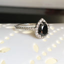 Pear Cut Black Diamond with White Diamond Halo