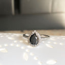 Pear Cut Black Diamond with White Diamond Halo