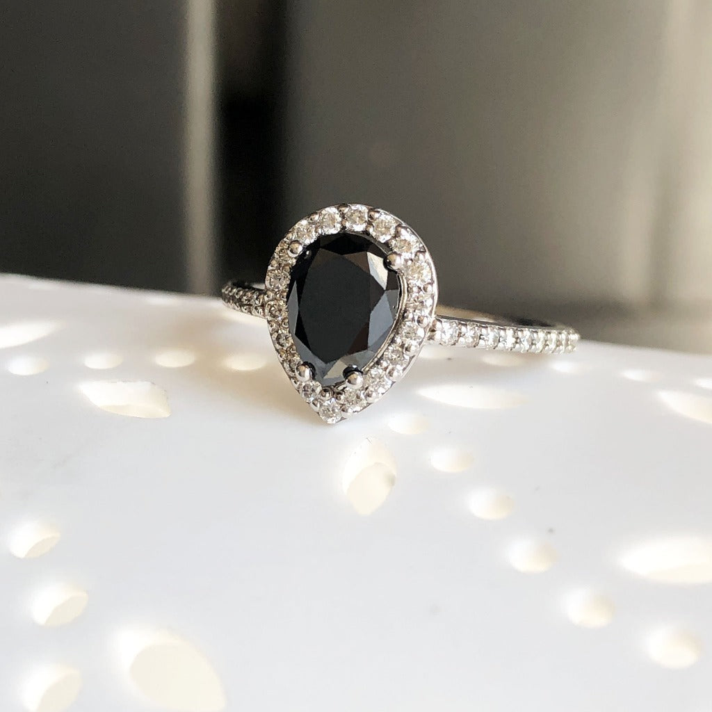 Pear Cut Black Diamond with White Diamond Halo