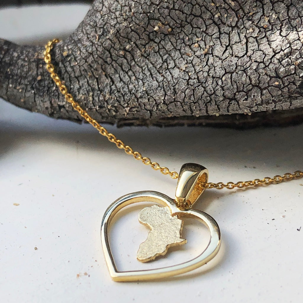 Hammered Matt Africa in a Gold Heart Pendant