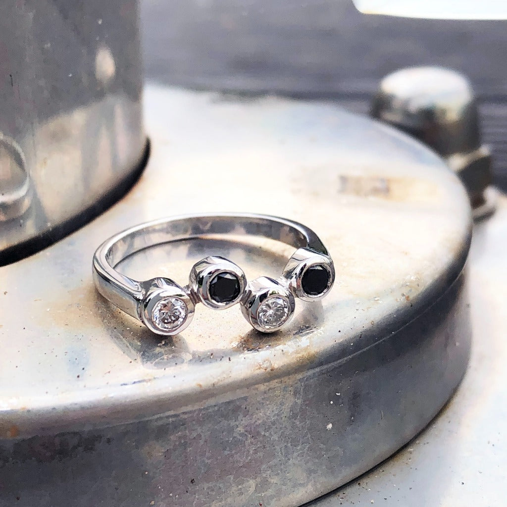 Alternating Black and White Tube Set Diamond Ring