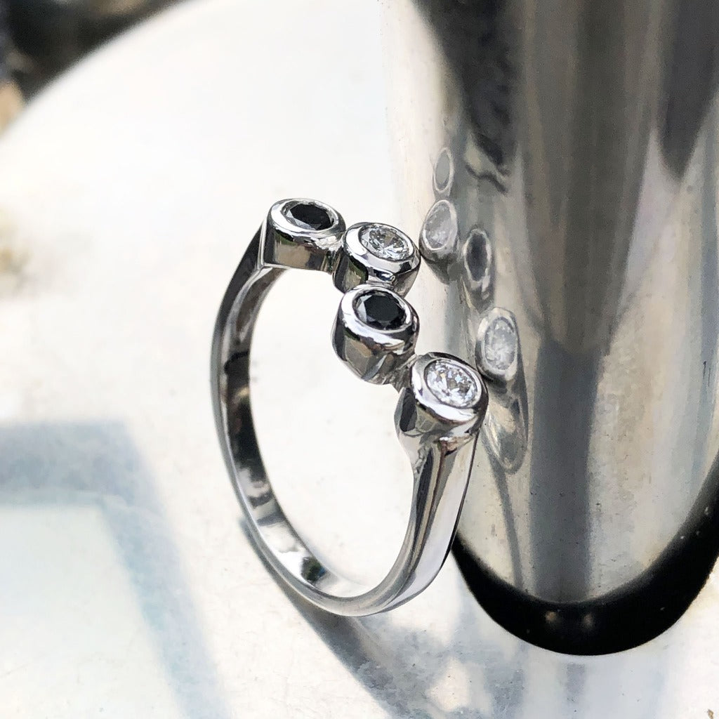 Alternating Black and White Tube Set Diamond Ring