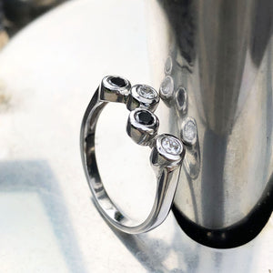 Alternating Black and White Tube Set Diamond Ring