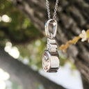 Round Cut Morganite with Diamond Trilogy Bale Accent Pendant