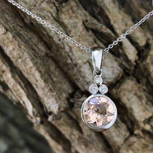 Round Cut Morganite with Diamond Trilogy Bale Accent Pendant