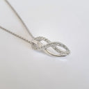 Interwoven Diamond and White Gold Pendant