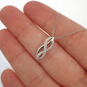 Interwoven Diamond and White Gold Pendant
