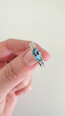 Landscape Set Oval Blue Topaz and Diamond ring