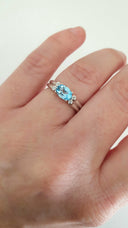 Landscape Set Oval Blue Topaz and Diamond ring