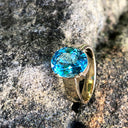 Large Oval Cut Blue Topaz And Yellow Gold Ring