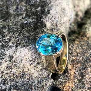 Large Oval Cut Blue Topaz And Yellow Gold Ring
