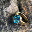 Large Oval Cut Blue Topaz And Yellow Gold Ring