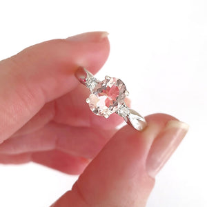 Lightly Crimped Oval Cut Morganite and Diamond Highlight Ring