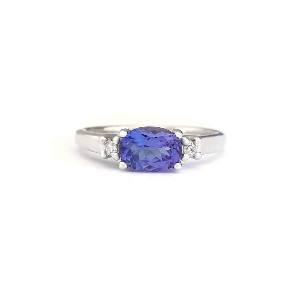 Exquisitely Deep Blue Oval Cut Tanzanite and Diamond Ring