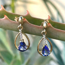 Yellow Gold Pear Cut Tanzanite Earrings with Diamond Strip Highlight