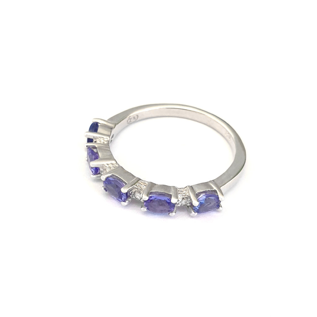 Half Eternity Oval Cut Tanzanite and Diamond Highlight Ring