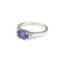 Exquisitely Deep Blue Oval Cut Tanzanite and Diamond Ring