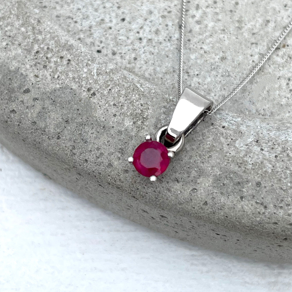 Petite Round Cut Ruby Four Claw Pendant