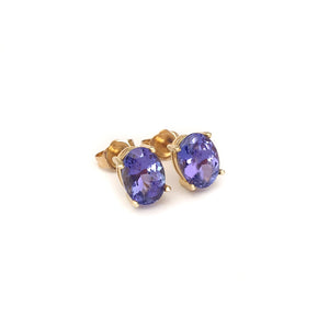 Classic Oval Cut Tanzanite Yellow Gold Four Claw Studs