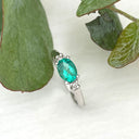 Graceful Oval Emerald and Diamond White Gold Ring