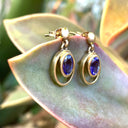 Double Hoop Oval Cut Bezel Set Tanzanite Drop Earrings