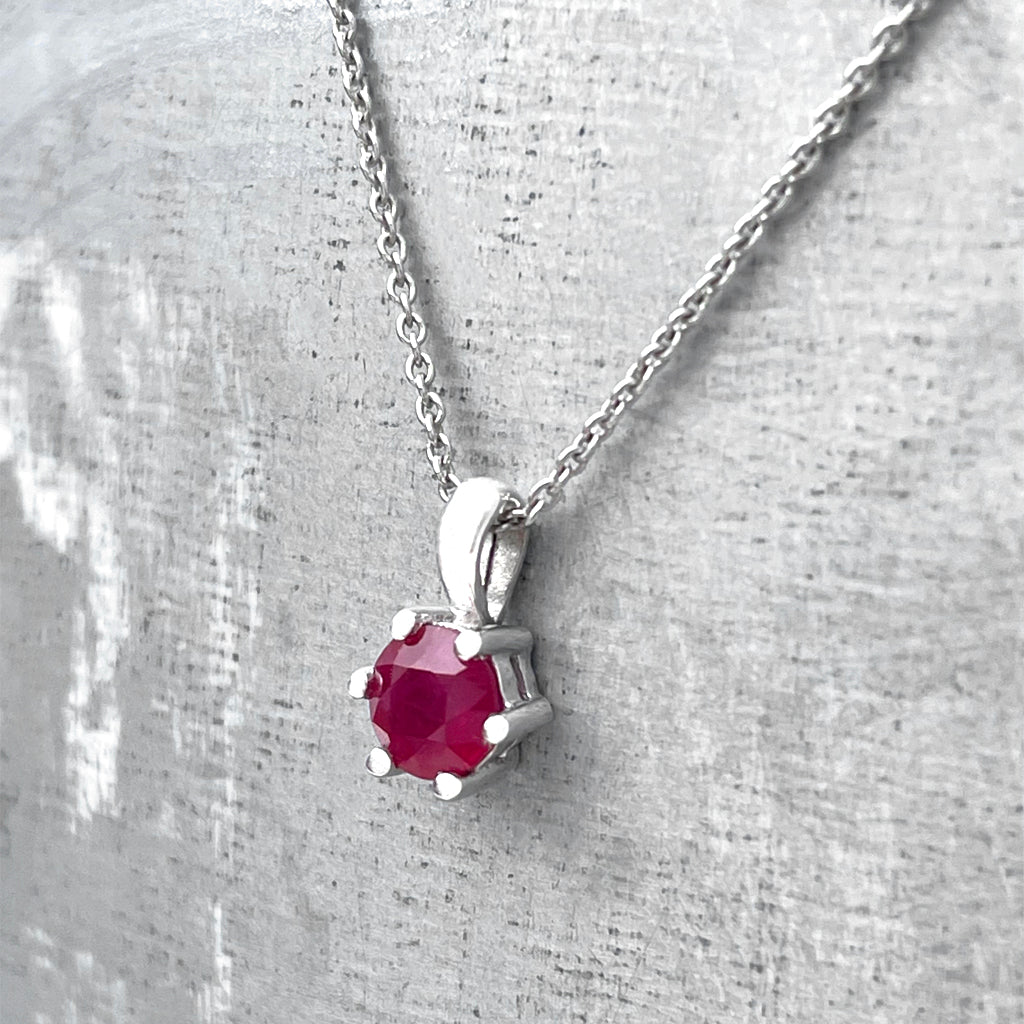 Delicate Petite Round Cut Ruby Six Claw Pendant