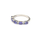 Half Eternity Oval Cut Tanzanite and Diamond Highlight Ring