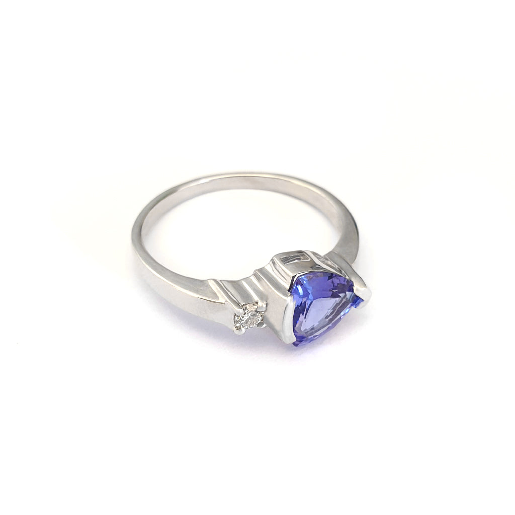 Trilliant Cut Tanzanite with Singular Diamond Accent ring
