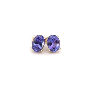 Classic Oval Cut Tanzanite Yellow Gold Four Claw Studs