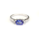 Exquisitely Deep Blue Oval Cut Tanzanite and Diamond Ring