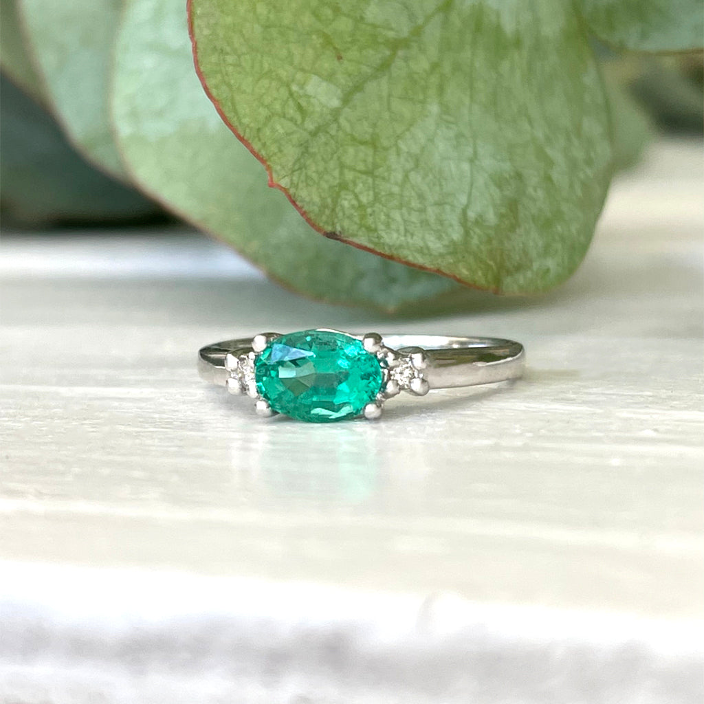 Graceful Oval Emerald and Diamond White Gold Ring