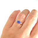 Exquisitely Deep Blue Oval Cut Tanzanite and Diamond Ring