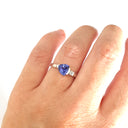 Trilliant Cut Tanzanite with Singular Diamond Accent ring