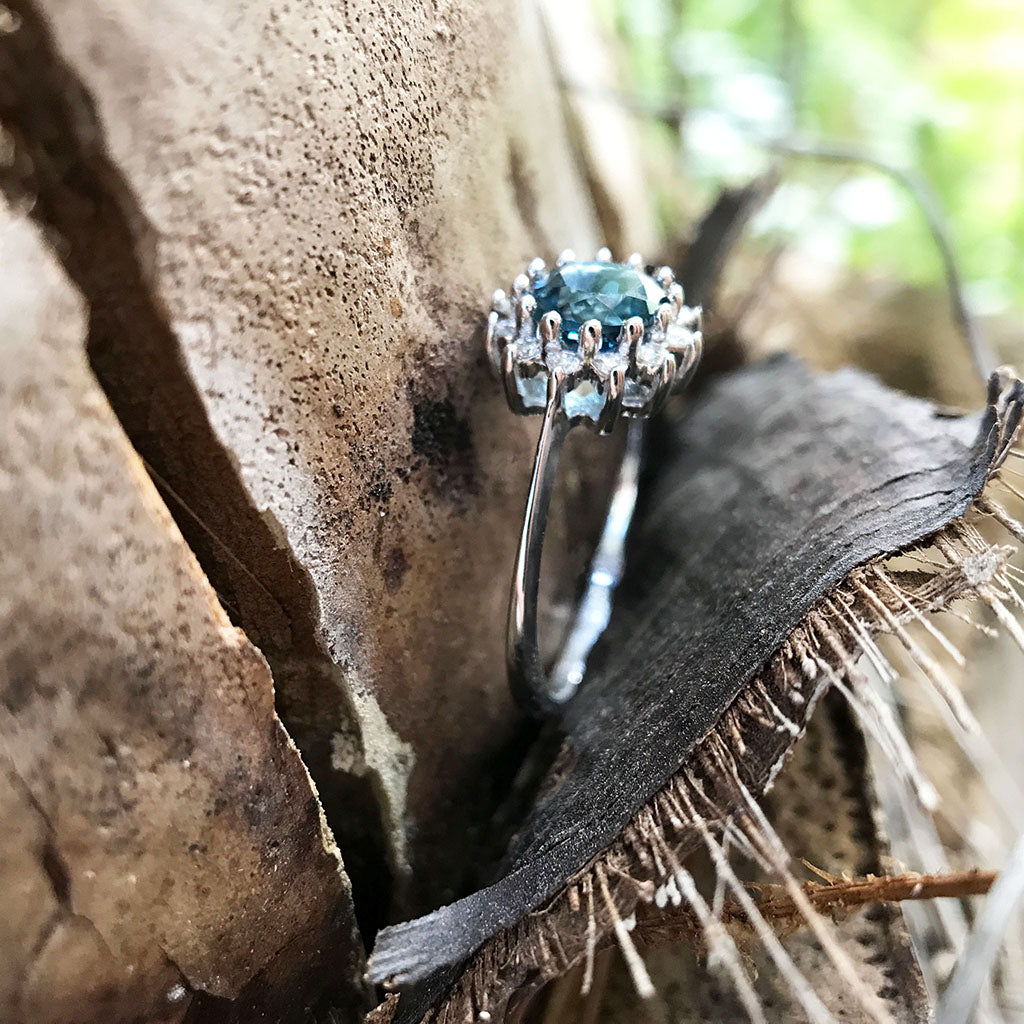 London Blue Topaz and Diamond halo Ring