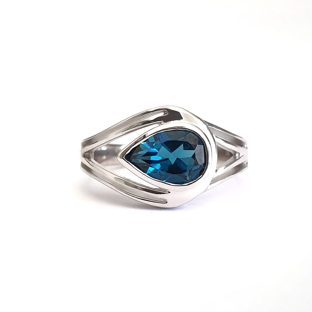 Band Pear Cut London Blue Topaz Ring