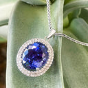 Luxurious Double Diamond Halo Oval Tanzanite Pendant