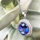 Luxurious Double Diamond Halo Oval Tanzanite Pendant
