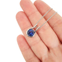 Luxurious Open Bezel Set Tanzanite Pendant