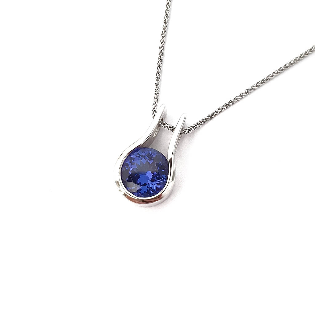 Luxurious Open Bezel Set Tanzanite Pendant