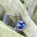 Luxurious Open Bezel Set Tanzanite Pendant