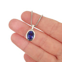 Luxurious Solid White Gold Bezel Set Oval Tanzanite Pendant