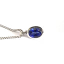 Luxurious Solid White Gold Bezel Set Oval Tanzanite Pendant