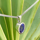 Luxurious Solid White Gold Bezel Set Oval Tanzanite Pendant